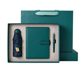 Corporate gift notebook set with custom QYC logo, leather cover, and premium packaging box.