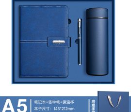 Corporate gift notebook set with custom QYC logo, leather cover, and premium packaging box.