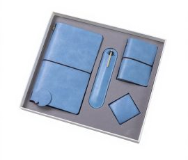 Corporate gift notebook set with custom QYC logo, leather cover, and premium packaging box.