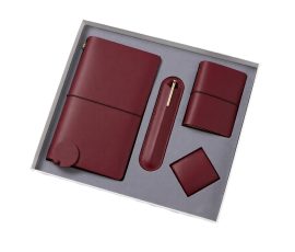 Corporate gift notebook set with custom QYC logo, leather cover, and premium packaging box.