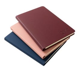 Burgundy PU leather notebook with debossed QYC logo, premium corporate gift.
