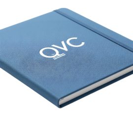 Cloth cover notebook with silk screen printed QYC logo, premium corporate gift.