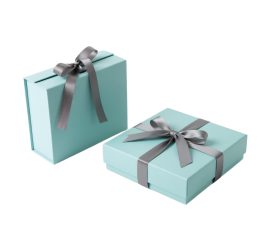 Collapsible rigid box with flat-packed and assembled states. Premium grey board and magnetic closure.